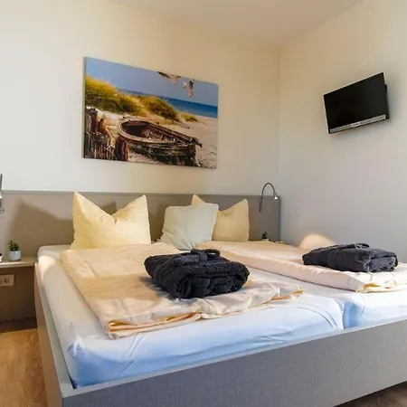 아파트 Duenenpark-heiligenhafen-haus-meerduene-wohnung-9-meerlounge